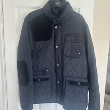 Mens Quilted Jacket With Front Zip And Press Stud Fastening. Multiple Pockets.