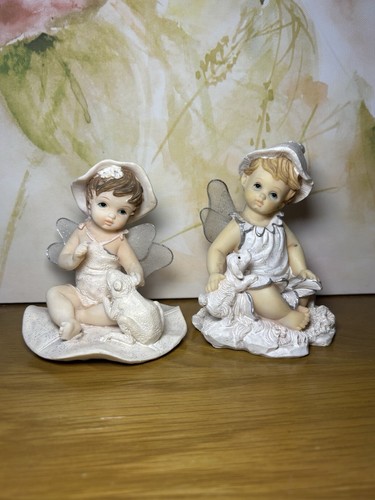 Small fairy figurines with dog