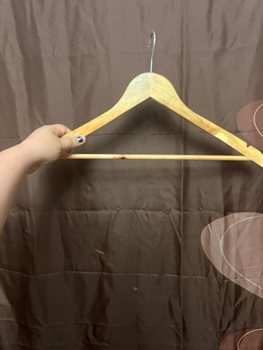 Used wooden clothes hanger - clothes,