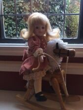 25% reduction Porcelain Doll on Wooden Rocking Horse Classic Dress Golden Hair 