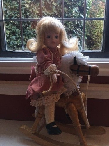 Reduction porcelain doll - reduction,