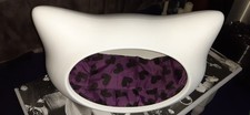 Unusual Whiskas cat head-shaped cat bed
