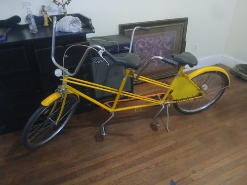 Yellow tandem bicycle dual - tandem,