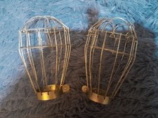 2 small gold coloured cage