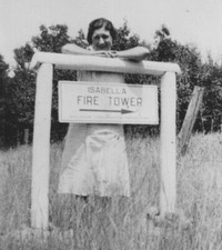 Woman Smiling Next to Isabella