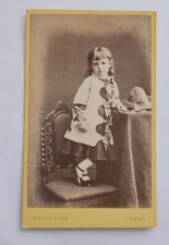 CDV OF GIRL STANDING ON CHAIR
