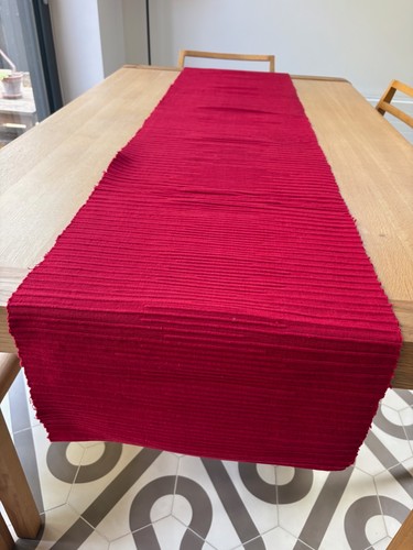 Long red table runner from