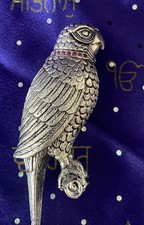 silver parrot perfume bottle