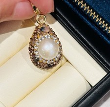 Genuine Freshwater Pearl Pendant Surrounded By Gemstone