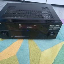 Pioneer VSX-920 AV Receiver including remote control.