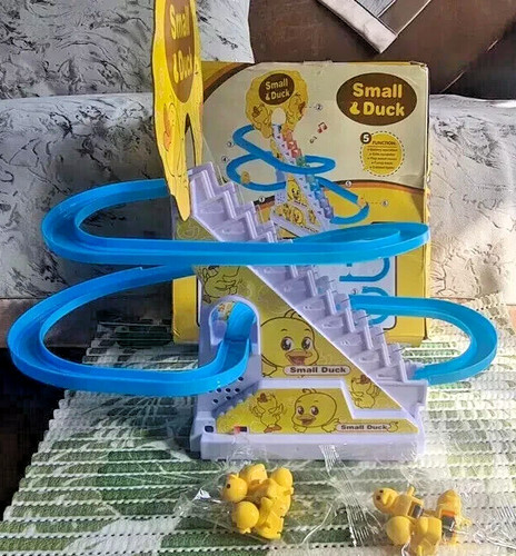 Duck climbing stairs - duck, toy