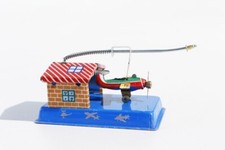 Aeroplane hangar tin toy