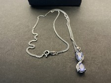 9CT WHITE GOLD PENDANT AND 16INCH  CHAIN 2 TANZANITE STONES+ TINY DIAMONDS 3.8GM