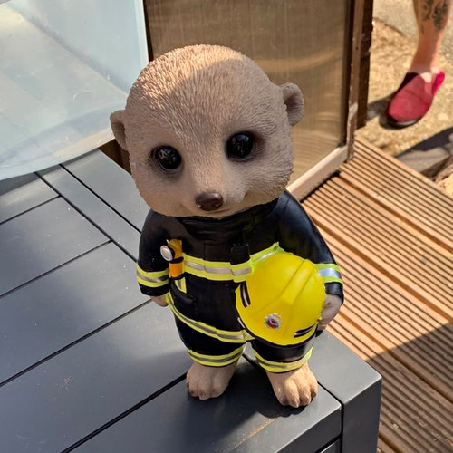 Meerkat firefighter figurine