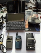 Ericsson bundle. Working MC218 in case. T28s and T28 World. T28 Desk Charger. 