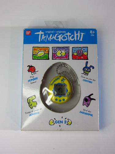Yellow bandai tamagotchi gen2 - bandai,
