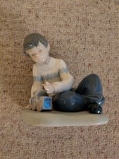 Nao Boy with Train Figurine