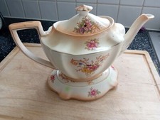 Large and lovely Crown Ducal 'Louis' teapot and stand in excellent condition .