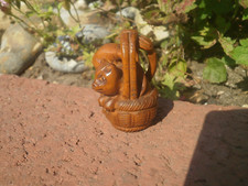 Hand Carved wood netsuke of a