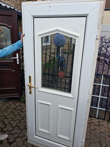 Used white upvc front door - front,