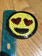 Sequin Heart Face Emoji