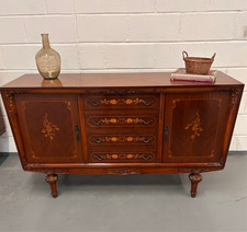 A Vintage French decorative inlaid sideboard with 4 drawers and 2 cupboards