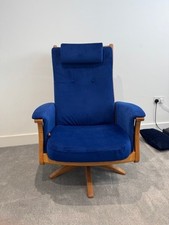Ercol Gina Reclining Swivel Chair – luxuriously upholstered in royal blue velvet