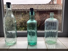 Three Vintage Bottles.