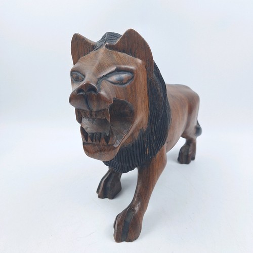 Hand carved wooden lion statue - carved,