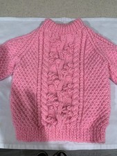 Hand knitted childs pink aran jumper size 20 inch chest 95% alpaca