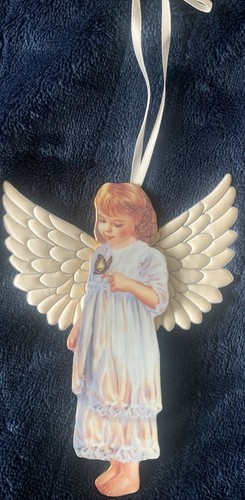 Angel caring by - by, dona
