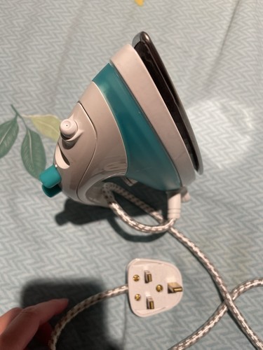 Small iron suitable for - a,