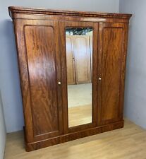 C19TH country house flame mahogany triple wardrobe