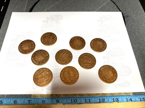 Fruit machine gaming token - machine,
