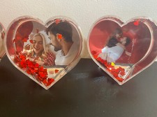 Heart shape snow - globe, with