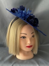 Blue hatinator with Beautiful Arrangement for Wedding Or Races