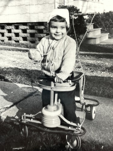 Photograph girl peddle - q3,