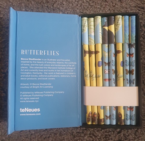 Set butterfly pens in - of,