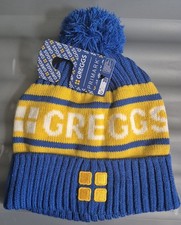 GREGGS BLUE YELLOW BOBBLE HAT
