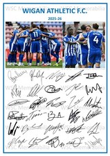 11886. 2025-26 Wigan Athletic Signed Team Photo Sheet (PRINTED AUTOGRAPHS - A4)