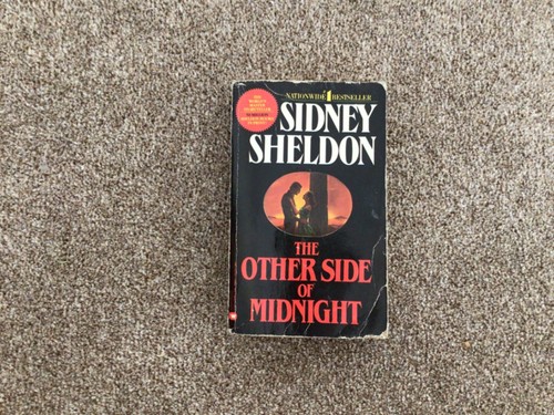 The other side - of, by