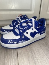 Royal Blue And White Sneakers with Heart lighting bolt pattern on the side
