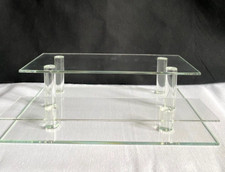 A GLASS DISPLAY STAND FOR