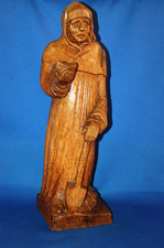 A 19th century carved wooden figure of St. Fiacre, patron saint of gardeners