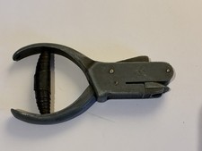 antique ticket hole puncher