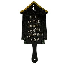 Cast iron outhouse - cast, sign