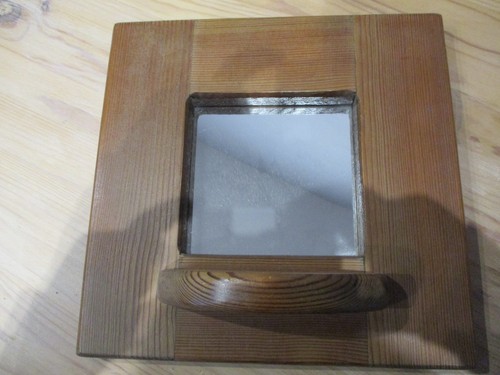 Small mirror with - penny, on