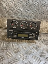 2009 HYUNDAI COUPE CENTRE CONSOLE GAUGES AND STEREO 94320-2C600
