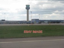 PHOTO  EAST MIDLANDS AIRPORT - CONTROL TOWER SEEN FROM THE RUNWAY AFTER LANDING.
