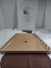 TK O' Briens  Stringed Wooden